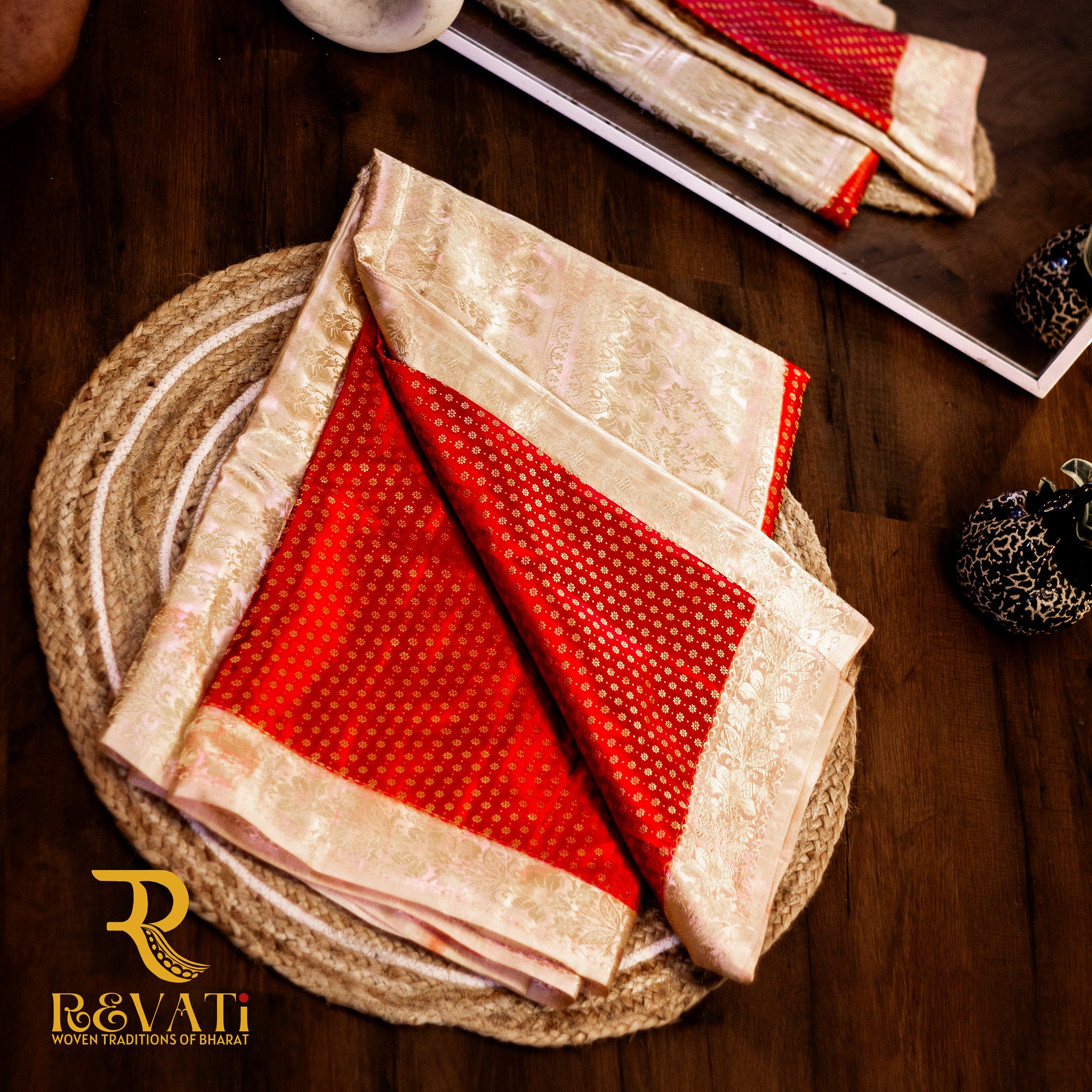 Banarasi beauty in deep red silk, featuring golden buti work and a rich floral zari border.