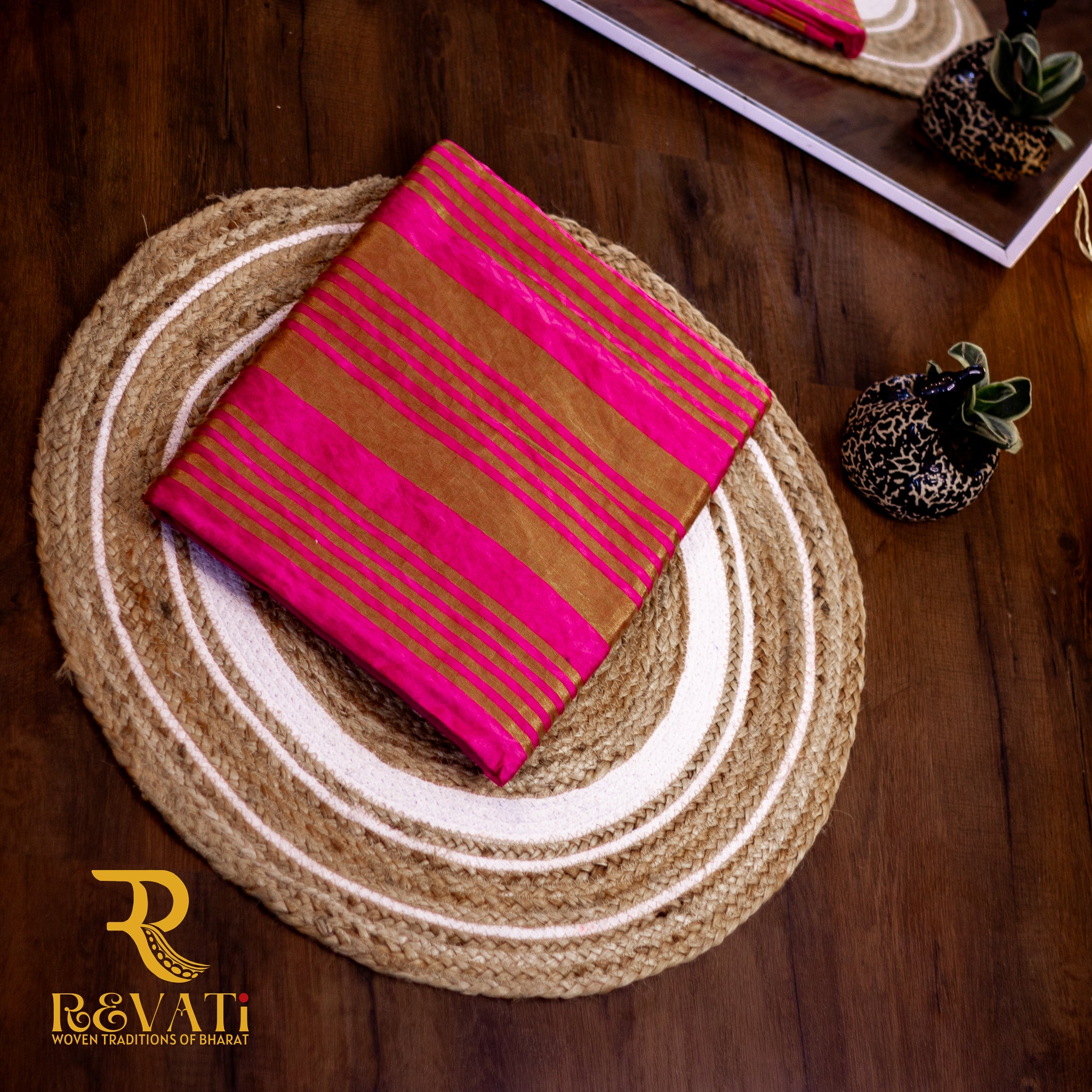 Magenta Pink Soft Silk Saree adorned with Gold Circular Motifs, a Subtly Striped Pallu, and Opulent Zari-Woven Borders