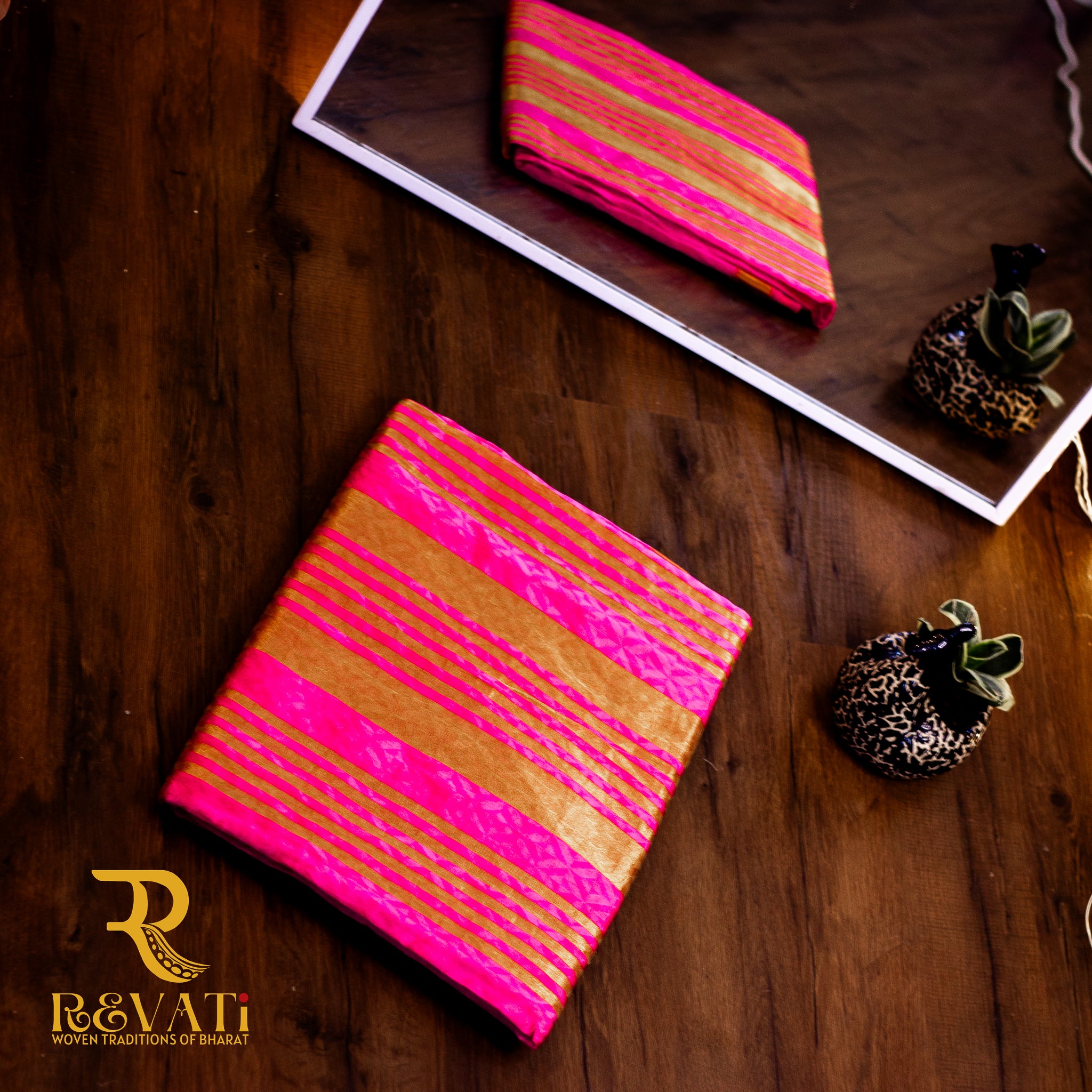 Magenta Pink Soft Silk Saree adorned with Gold Circular Motifs, a Subtly Striped Pallu, and Opulent Zari-Woven Borders