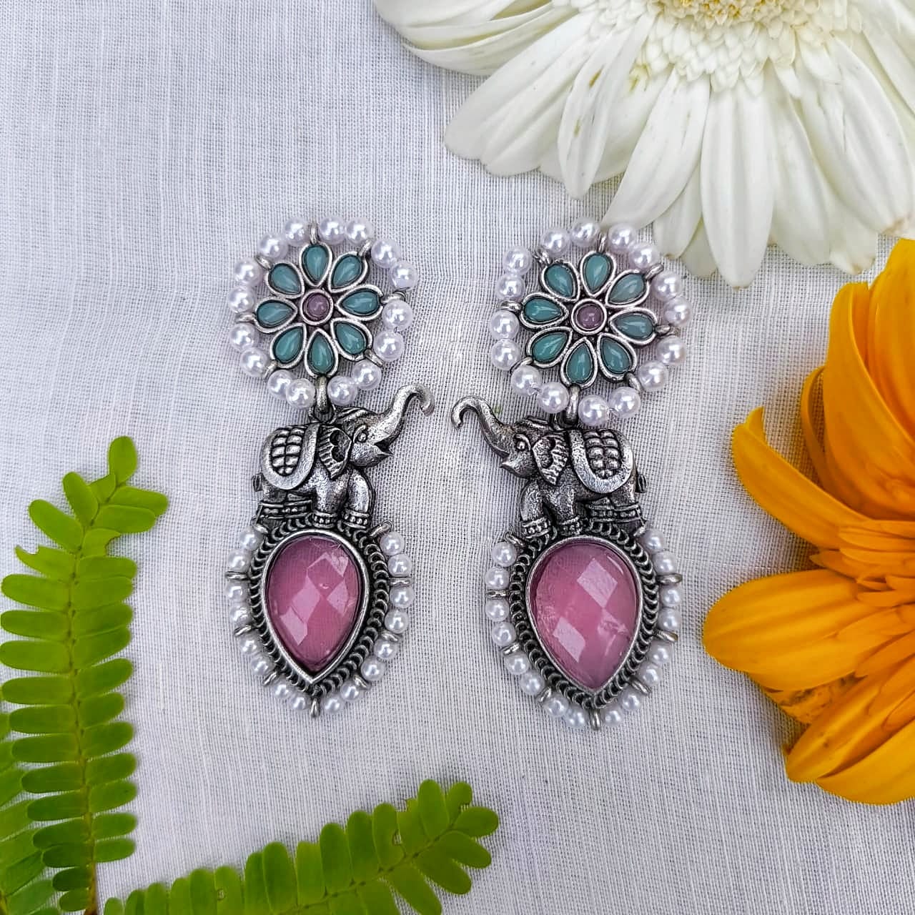 Handcrafted Silver Elephant Earrings with Green Gemstone & Pearl Detailing – Ethnic Jewelry
